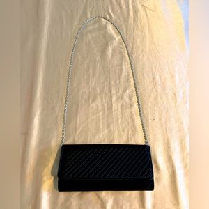 brand: talbots, color: black, silver chain with mirror inside.